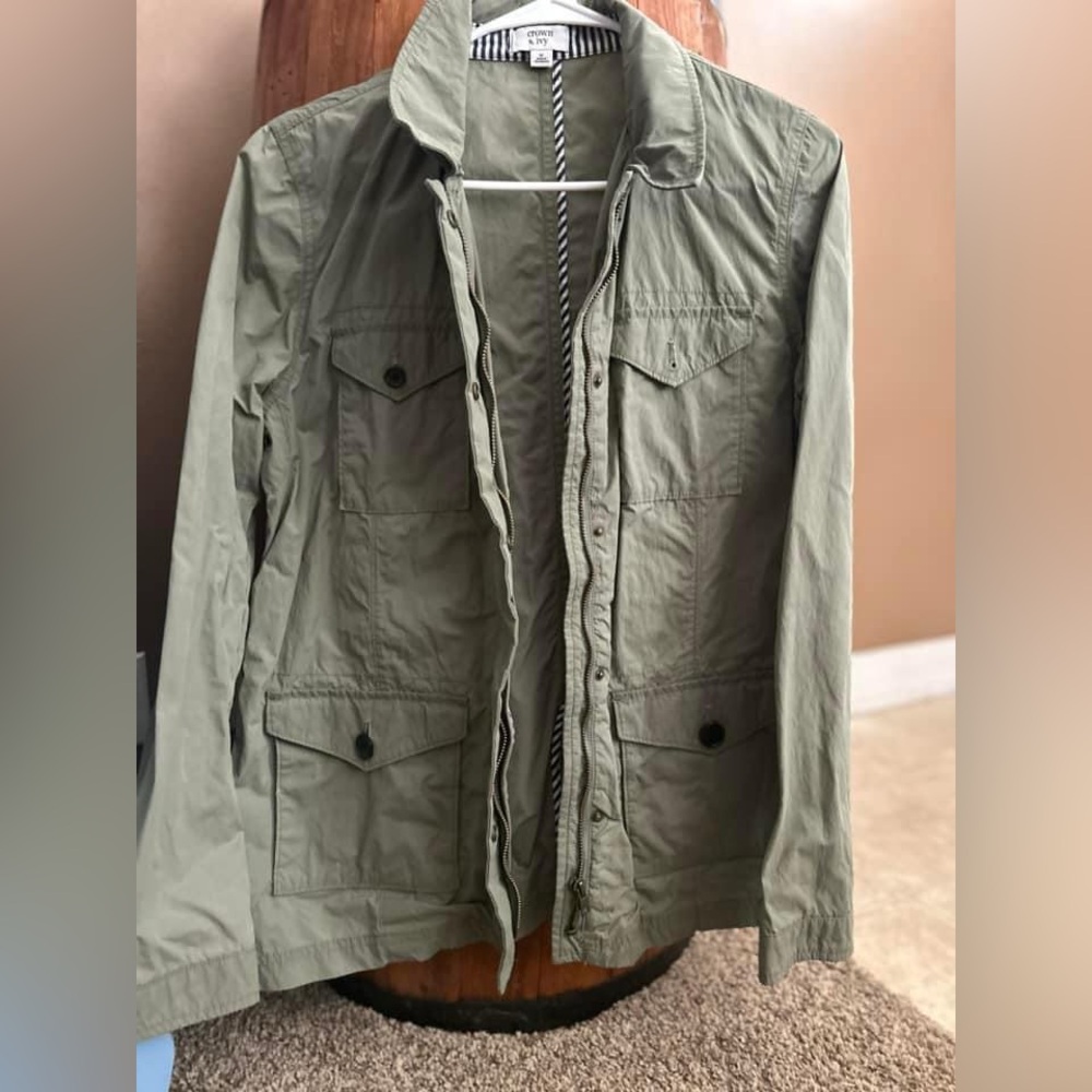Women’s olive green coat.